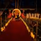 Where glowing lights, a moonlit backdrop and a red-carpet entrance come together for an unforgettable “Marry Me” moment.