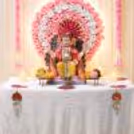 Ganpati Decoration Background Neon Light Artificial Flower Arrangements Decorative Pink Tassel Strings For Festive Pooja Setup