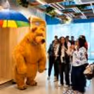 The Bear mascot interacting with children and guests during a birthday party to make fun moments.