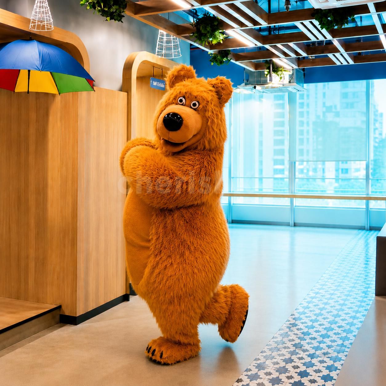 Close-up of the happy Bear mascot setting up photos and having fun with kids at a party.