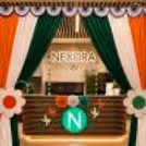 Butterfly string, paper rosette and Tricolor backdrop decoration at the entrance to celebrate patriotic Independence Day.