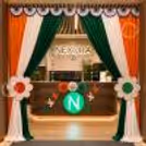 Saffron, white and green satin drapes, Ashoka Chakra decorations and floral cut-outs on Independence Day Tricolor Entrance Decoration.