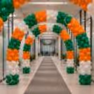 A Tricolour Entrance Balloon Arch decorated with orange, white and green latex balloons for patriotic celebrations.