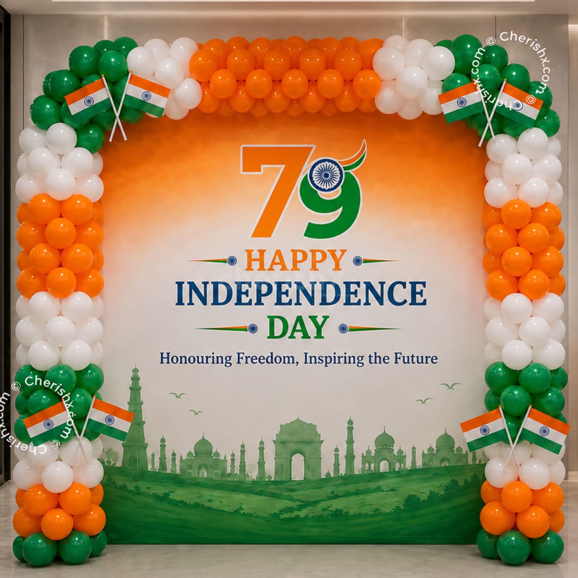 Patriotic flex banner, tricolour balloons and paper flag decorations for 79th Independence Day-related office celebrations.
