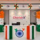 Patriotic reception, tricolour balloons and hanging paper decorations for 15 Aug at the entrance of the office.