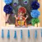 DIY Ganesh Chaturthi decor with peacock theme backdrop