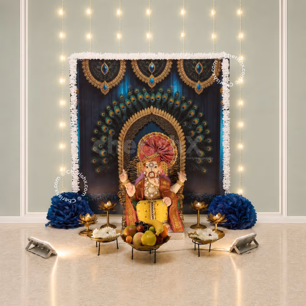 Peacock Elegance DIY Backdrop Decoration Kit for Ganpati decoration, peacock theme backdrop, gold stand, white garlands, blue pom poms.