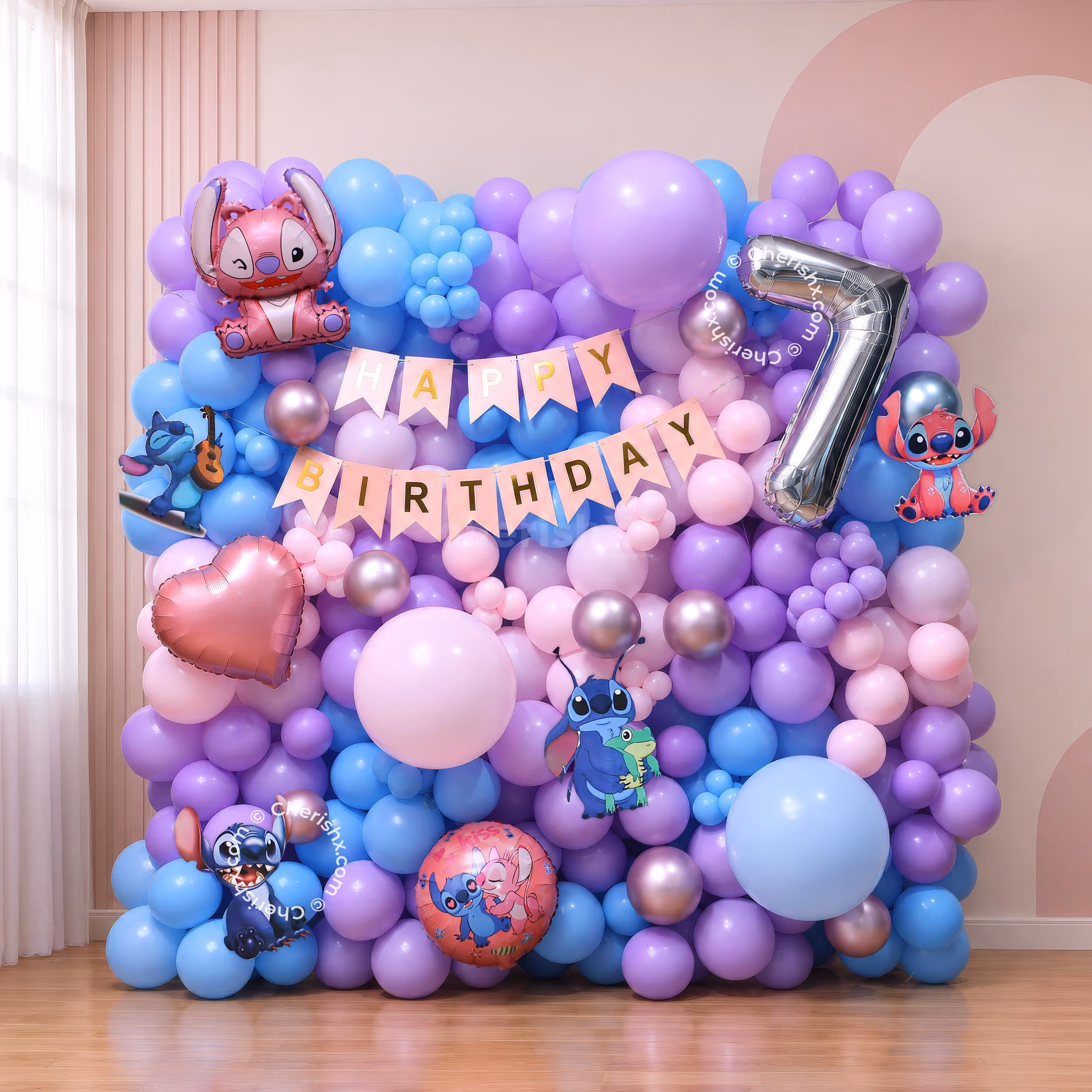 Stitch Birthday Decoration with a pastel balloon wall, a Happy Birthday banner, and character foil balloons.