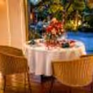 Private cabana overlooking the pool for a romantic dining experience