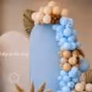 Every corner of this space invites you to click, smile, and revel in the magic of this subtly captivating blue and brown balloon theme.