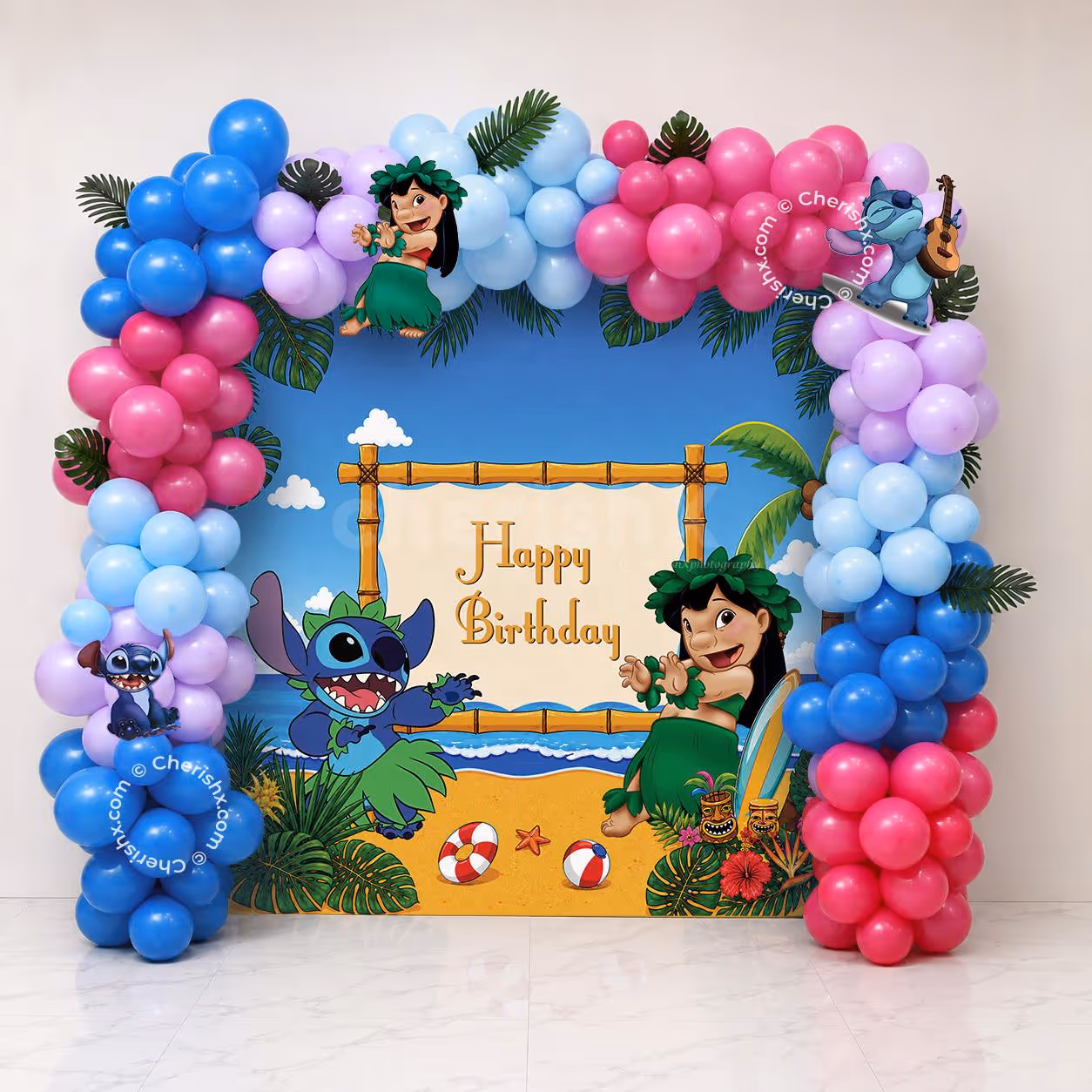Birthday Balloon Wall with colourful blue, pink and purple balloon arch and tropical character backdrop.
