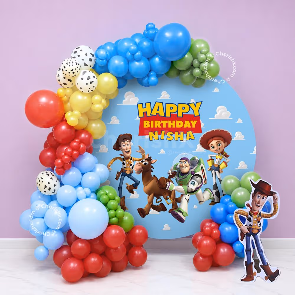 Colourful balloon arch, Happy Birthday cutout, personalised Happy Birthday backdrop for the Toy Story birthday party.