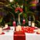 Intimate cabana dining experience with five-course meal, wine and romantic table setup