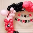 The ultimate pink and black photo backdrop for your birthday.