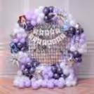 Themed Paper Cut-Outs On The Balloon Arch Add To The Concert Vibes Of The Birthday Celebration.