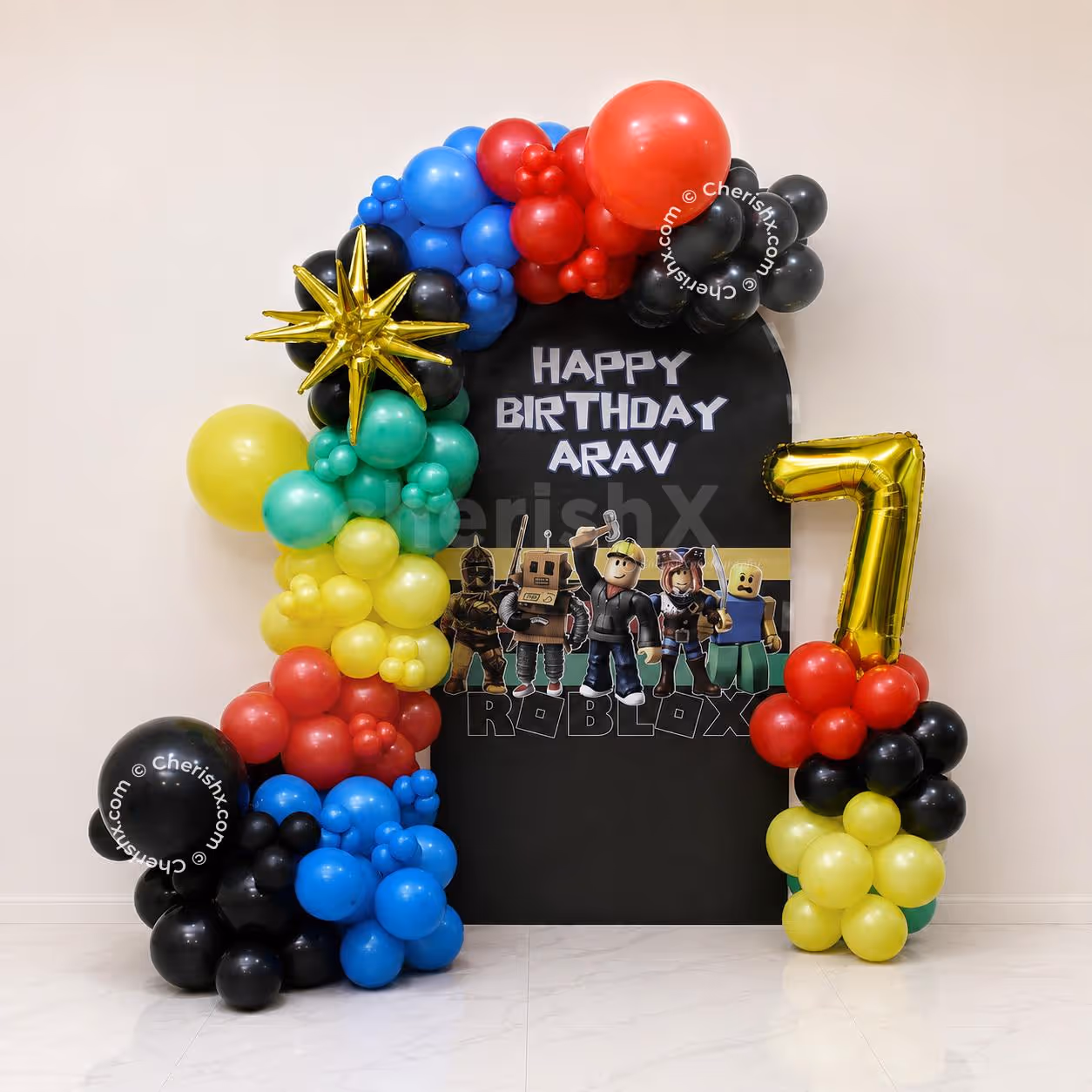 Roblox themed birthday decoration with personalized flex backdrop, colourful balloon arch and golden age number