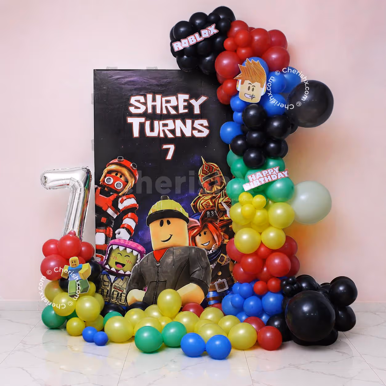 Customisable flex backdrop, colourful balloon arch and themed character cutouts for Roblox Adventure birthday decorations.