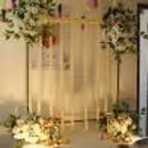 Floral Ganpati decoration with hanging pearl strings