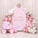 Welcome Baby Vintage Blush Balloon Decoration with a big pink baby girl backdrop and balloon arch.