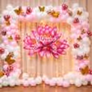 Pastel pink and white balloons with elegant lotus cutout
