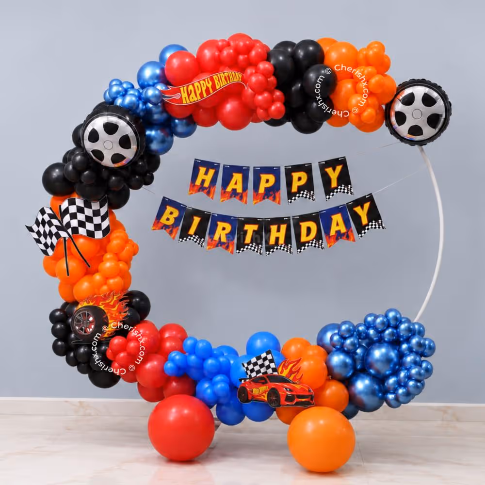 Red, Blue, Orange and Black Balloon Arch for Hot Wheels Turbo Ring Birthday Decoration.