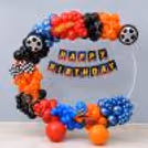 Red, Blue, Orange and Black Balloon Arch for Hot Wheels Turbo Ring Birthday Decoration.