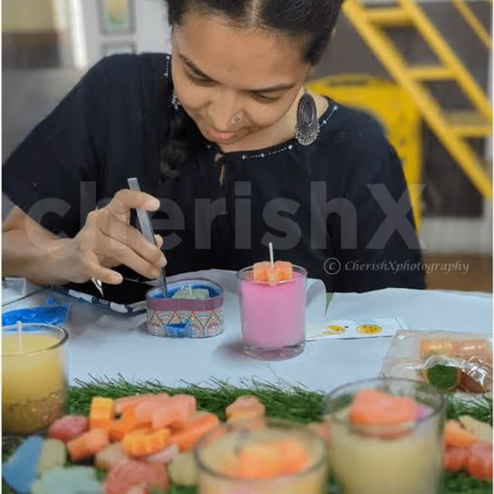 hands-on wax candle-making experience, crafting personalised candles with wax, wicks and floral decorations.