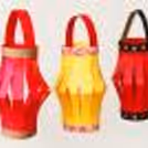 Creative lantern-making workshop with participants designing and decorating handmade lanterns to take home.
