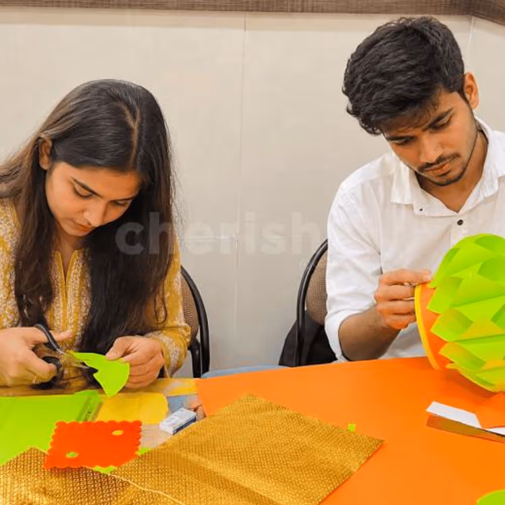 Hands-on lantern-making activity where participants cut, assemble and decorate their own festive lanterns.