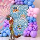 Pastel balloon arch with Zootopia character decor