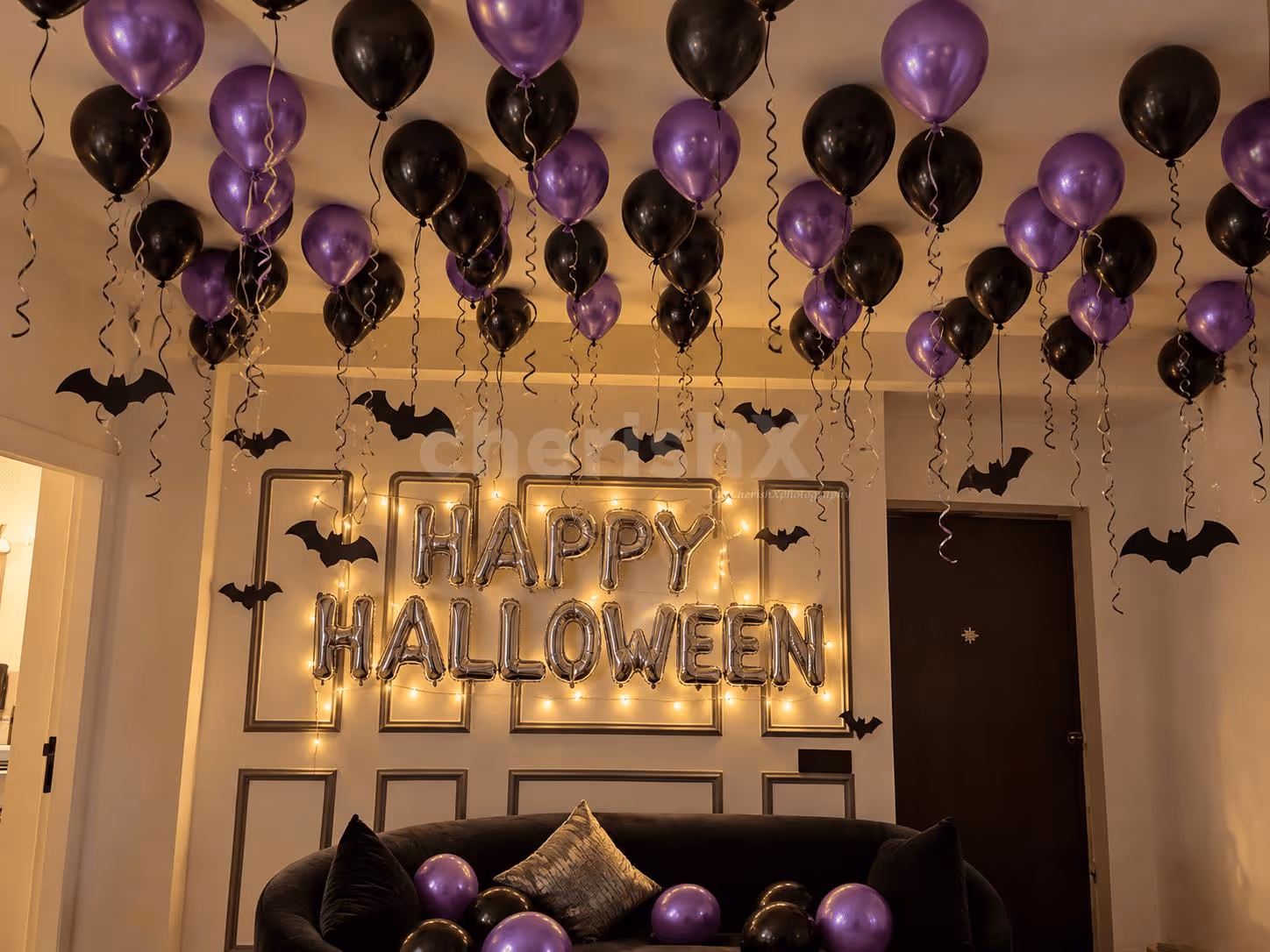 Affordable Halloween decor at home with black and purple balloons