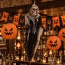 - Halloween reception and lobby decoration with orange lanterns and themed bunting