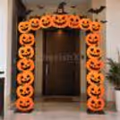 Spooktacular Halloween entrance decoration with colourful pumpkin cutout arch, witch hat and hanging black bats for home and party entrances.