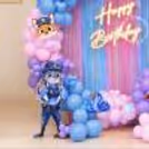 Zootopia Inspired Birthday Backdrop with Pink, Blue and Purple Balloon Garland.