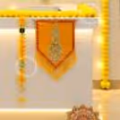 Traditional Diwali Office Decoration with Floral Hangings and Festive Cutouts.