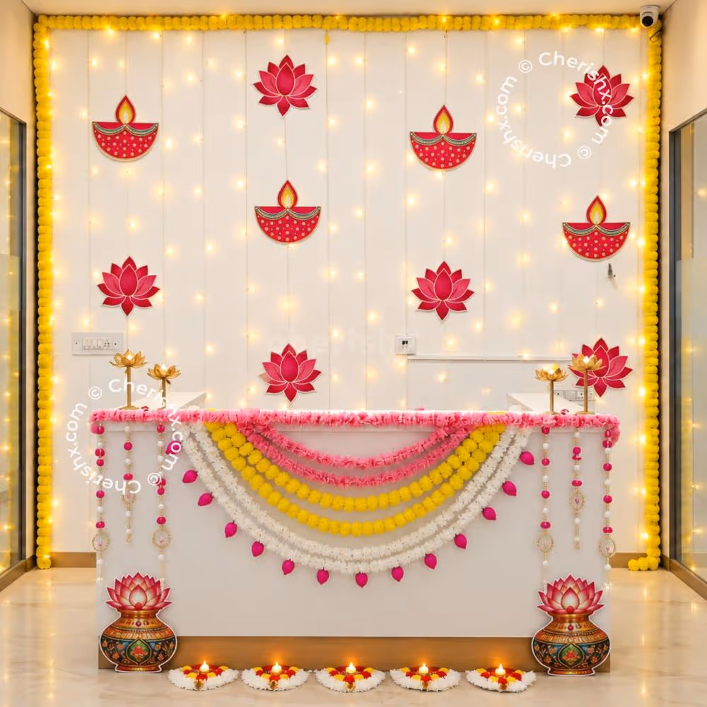 Elegant Pink Lotus Diwali Reception Decoration with Yellow Marigold Garlands and Warm Lights.