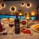 Elegant poolside dining table for couples celebrating Karwa Chauth in Connaught Place.