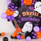A themed broom cutout completes the spooky decoration.