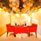 Beautifully decorated cabana with a romantic flower petal pathway and glowing candles.