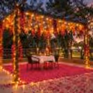 Beautifully decorated terrace pergola dining setup by the greens at Hamoni.