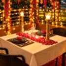 Beautifully decorated terrace pergola dining setup by the greens at Hamoni.