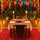 Dreamy candlelight dining experience with rose petals and glowing lights at Hamoni.