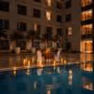 Romantic private dining experience for couples beside the swimming pool at Hyatt Centric Gurgaon.