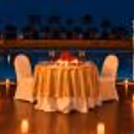 Romantic poolside candlelight dinner at Hyatt Centric Gurgaon with elegant table décor and beautiful evening ambience.