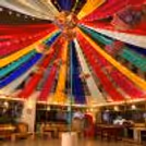 Traditional hanging umbrellas with warm fairy lights.