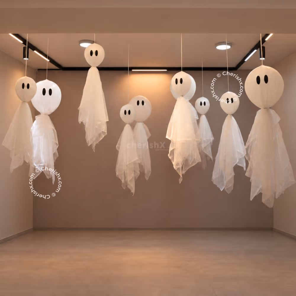 Small Halloween ghosts with flowing white net fabric