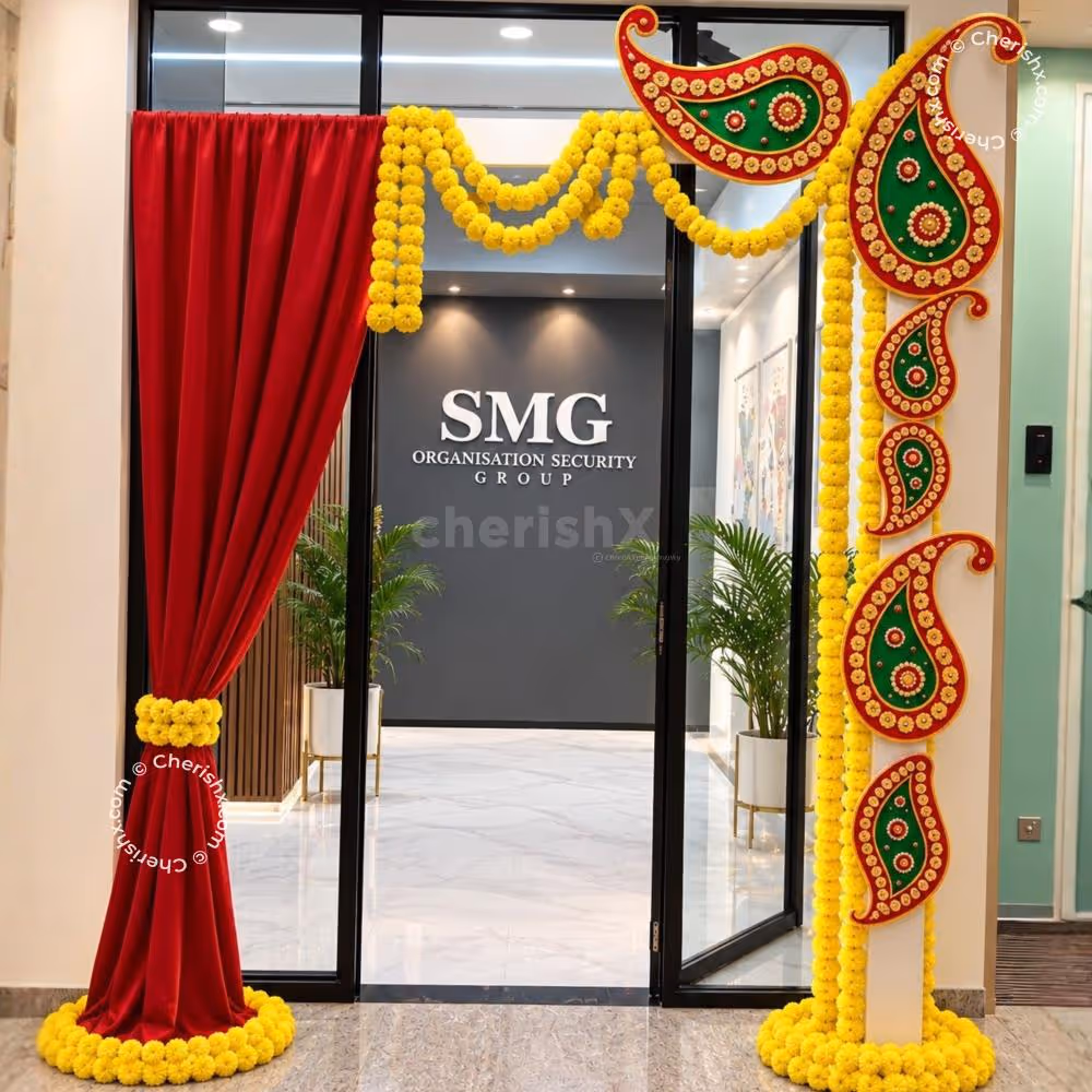 Florals and bright drapes make an impressive festive welcome area.