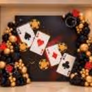 Casino Ace Balloon Backdrop with Black & Gold Balloons
