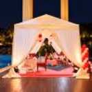 Cozy Couple Seating with Floral Décor for a Romantic Karwa Chauth Celebration