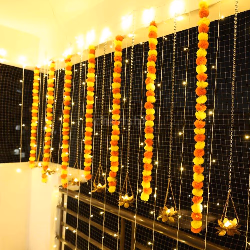 Vertical Marigold Garlands and Glowing Fairy Lights Decor for Diwali Week.